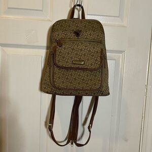 Rossetti Khaki & Brown mini backpack with synthetic brown trims & straps.